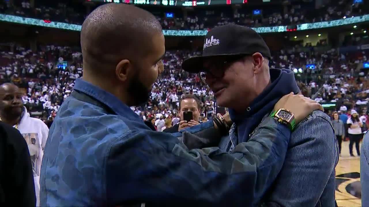 Video: Gord Downie, Drake embrace at Raptors game