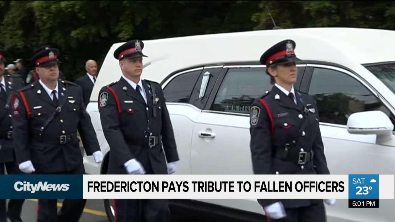 thousands attend funeral for fallen fredericton officers