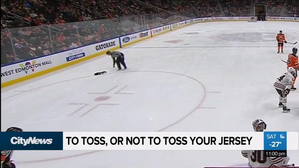 oilers jersey toss