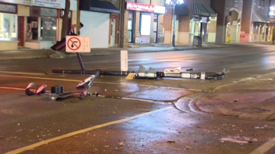 Man facing charges after vehicle crashes into parked cars, light standards